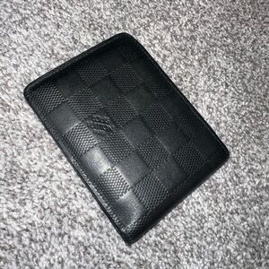 Men’s Louis Vuitton black wallet. Used.